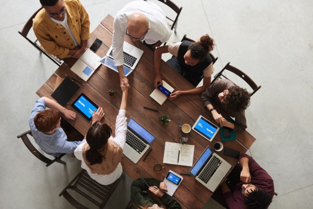 group of persons sitted round table